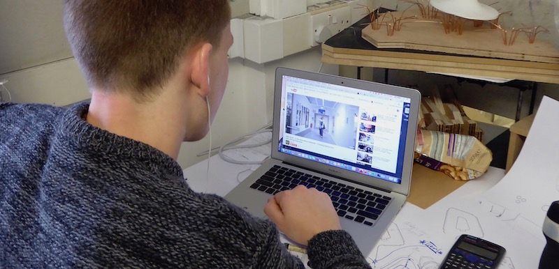 Student watching tutorial on YouTube